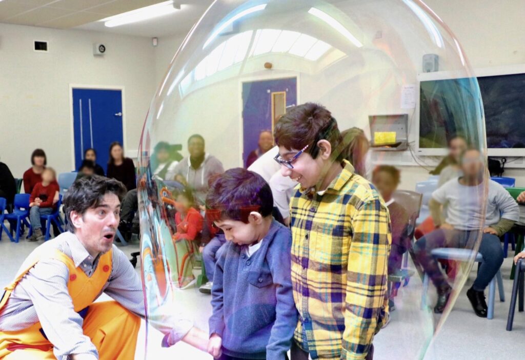 Frank puts two boys in a bubble